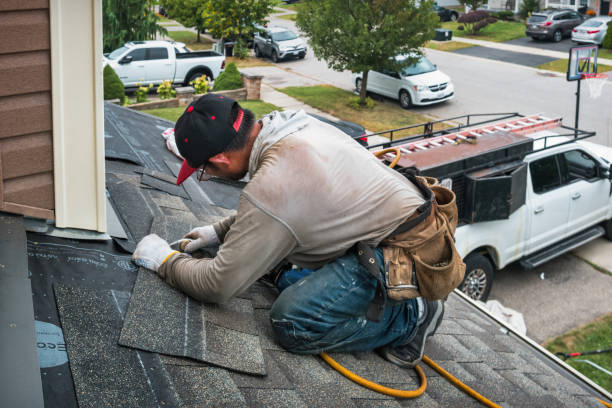 Professional Roof Replacement technician working in Marlow, NH